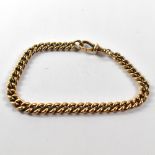 A late 19th century 9ct rose gold bracelet made from a watch chain, with hoop,