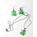 A sterling silver and jadeite necklace and earring jewellery suite.