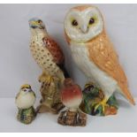 BESWICK; a large pottery owl, height 18cm, a pottery kestrel on plinth, height 17cm, a goldcrest no.