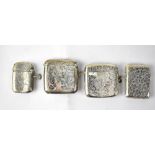 Four hallmarked silver vestas, each with engine turned decoration, various dates and makers,