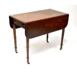 A George III mahogany Pembroke table wit