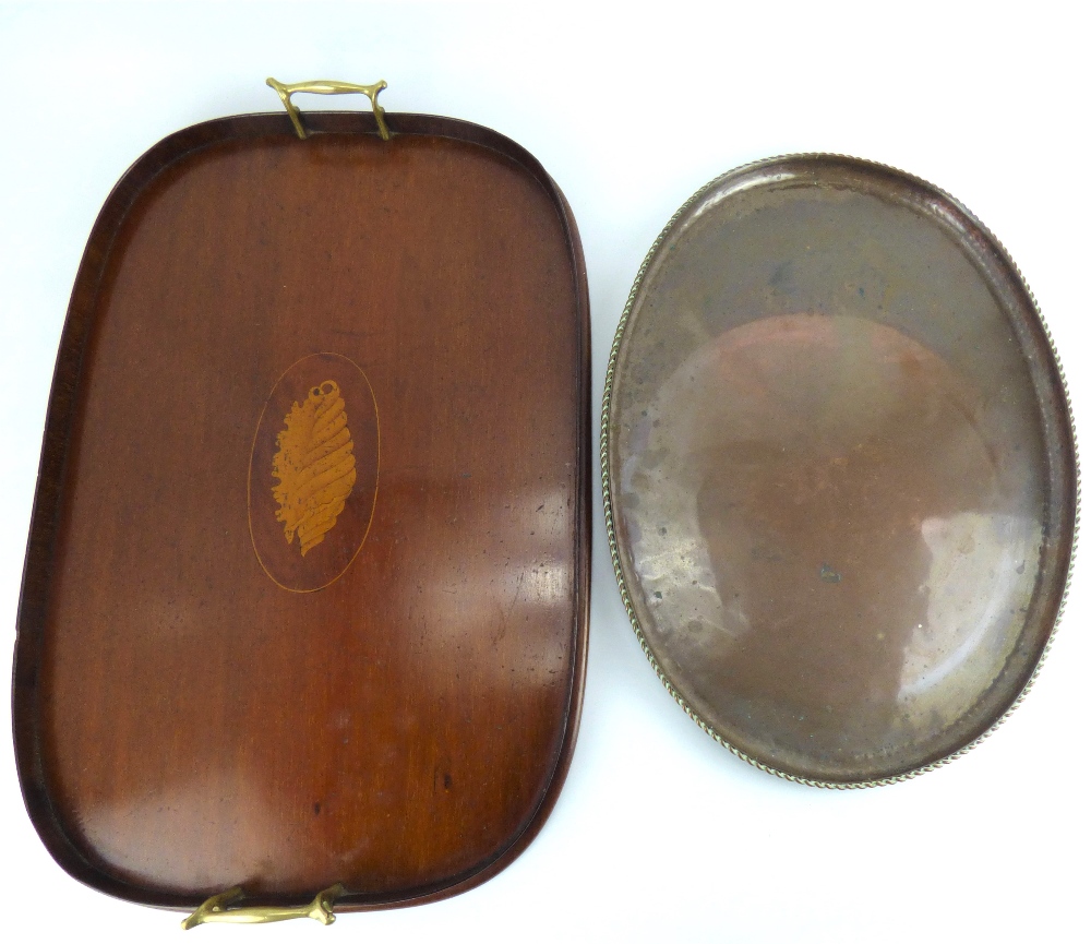 HUGH WALLACE; an Arts & Crafts brass oval tray with ropetwist edge, 46 x 43cm, marked 'HW',