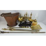 Various items of fireside brass and copper, to include a copper helmet coal scuttle,