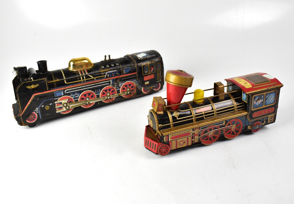 A Japanese battery-operated tinplate figure eight movement and mystery action train, length 31cm,