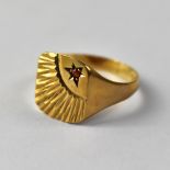 A 9ct gold gentlemen's vintage signet ring, set with small orange stone in star mount,