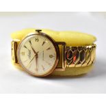 ACCURIST; a gentlemen's vintage 9ct gold antimagnetic wristwatch,