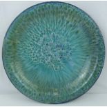 A very large modern studio pottery table centre bowl/fruit bowl, with mottled green and blue glaze,