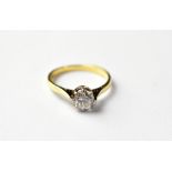 An 18ct gold ring set with solitaire brilliant cut diamond in an eight claw setting, size K,