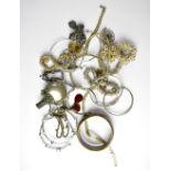 A quantity of vintage jewellery to include bangles, etc.