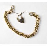 A 9ct yellow gold link bracelet with padlock clasp and safety chain, approx 13g.