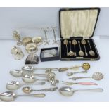 Various small items of hallmarked silver to include napkin rings, cased coffee spoon set,