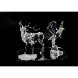 SWAROVSKI; a 'Rare Encounters, Stag' figure, height 15cm, together with a bald eagle figure,