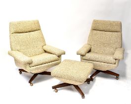 A pair of 1960s swivel reclining armchairs upholstered in a woven mushroom-coloured fabric,