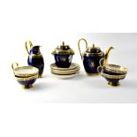 A Sèvres part tea service in the Georgian style, cobalt blue ground, gilt-heightened throughout,