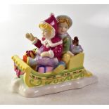 ROYAL DOULTON; a Christmas figure group from the Childhood Memories series 'Winter Fun',