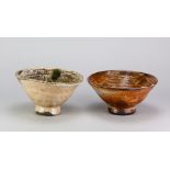 NIC COLLINS (born 1958); a wood fired stoneware bowl covered in shino glaze, incised signature,