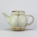 MIKE DODD (born 1943); a stoneware lobed teapot covered in willow ash glaze, impressed MJD mark,