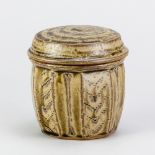 MIKE DODD (born 1943); a stoneware caddy covered in green ash and granite glaze with incised and