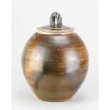 MICHAEL CASSON (1925-2003); a stoneware jar and cover washed with iron glaze with cobalt spot