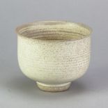 DEREK CLARKSON (1928-2013); a porcelain bowl covered in silky white glaze, impressed DC mark dated