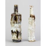 TERRENCE BUNCE; a stoneware bottle covered in white and tenmoku glaze, incised TB mark, height 27.