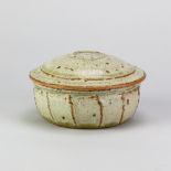 RICHARD BATTERHAM (1936-2021); a stoneware cut sided butter dish covered in green ash glaze,