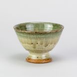 RICHARD BATTERHAM (1936-2021); a small stoneware tazza covered in green ash glaze with cobalt tinted