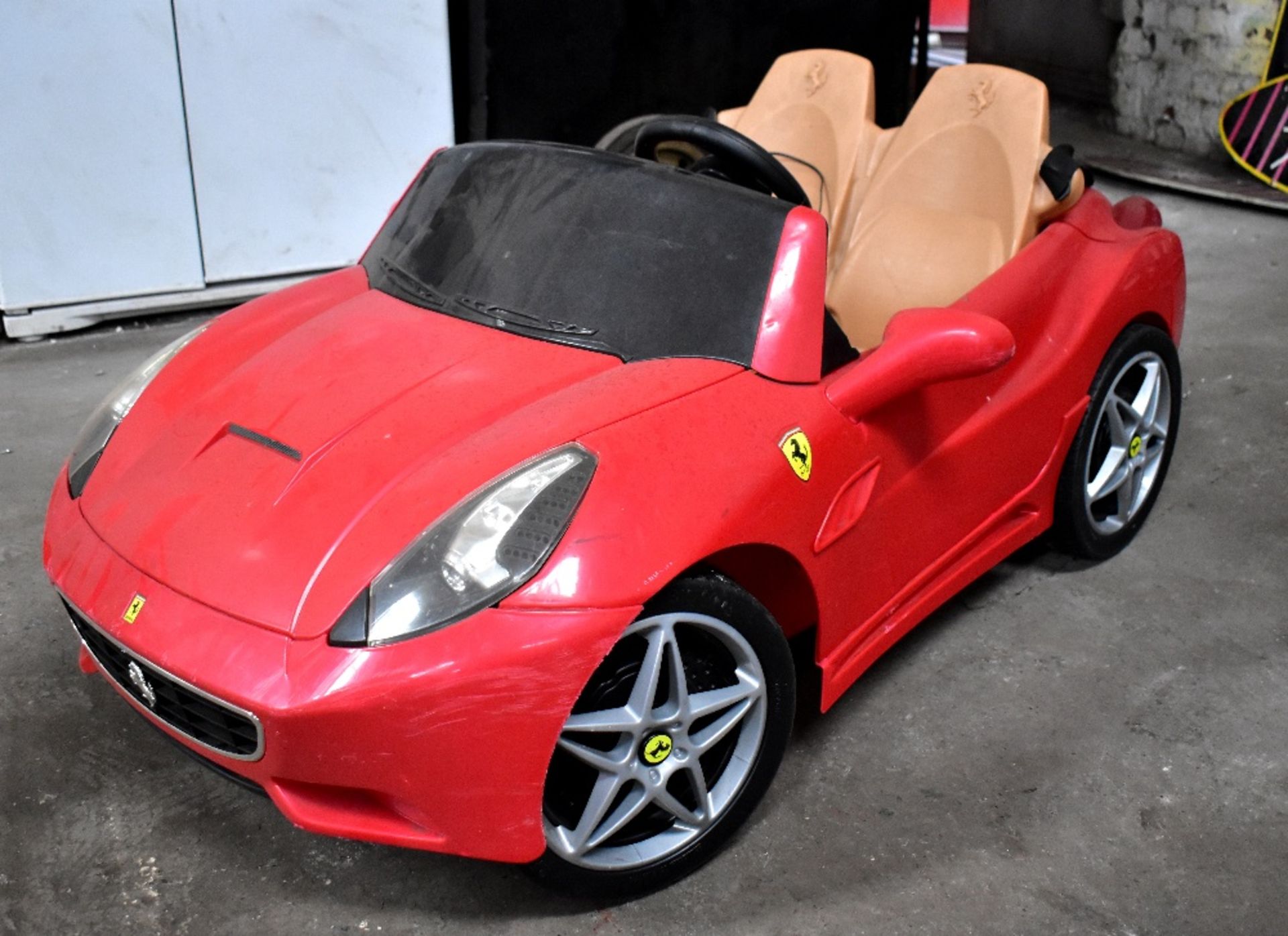 FEBER; a children's two-seat electric ride-along model of a convertible Ferrari (with charger,