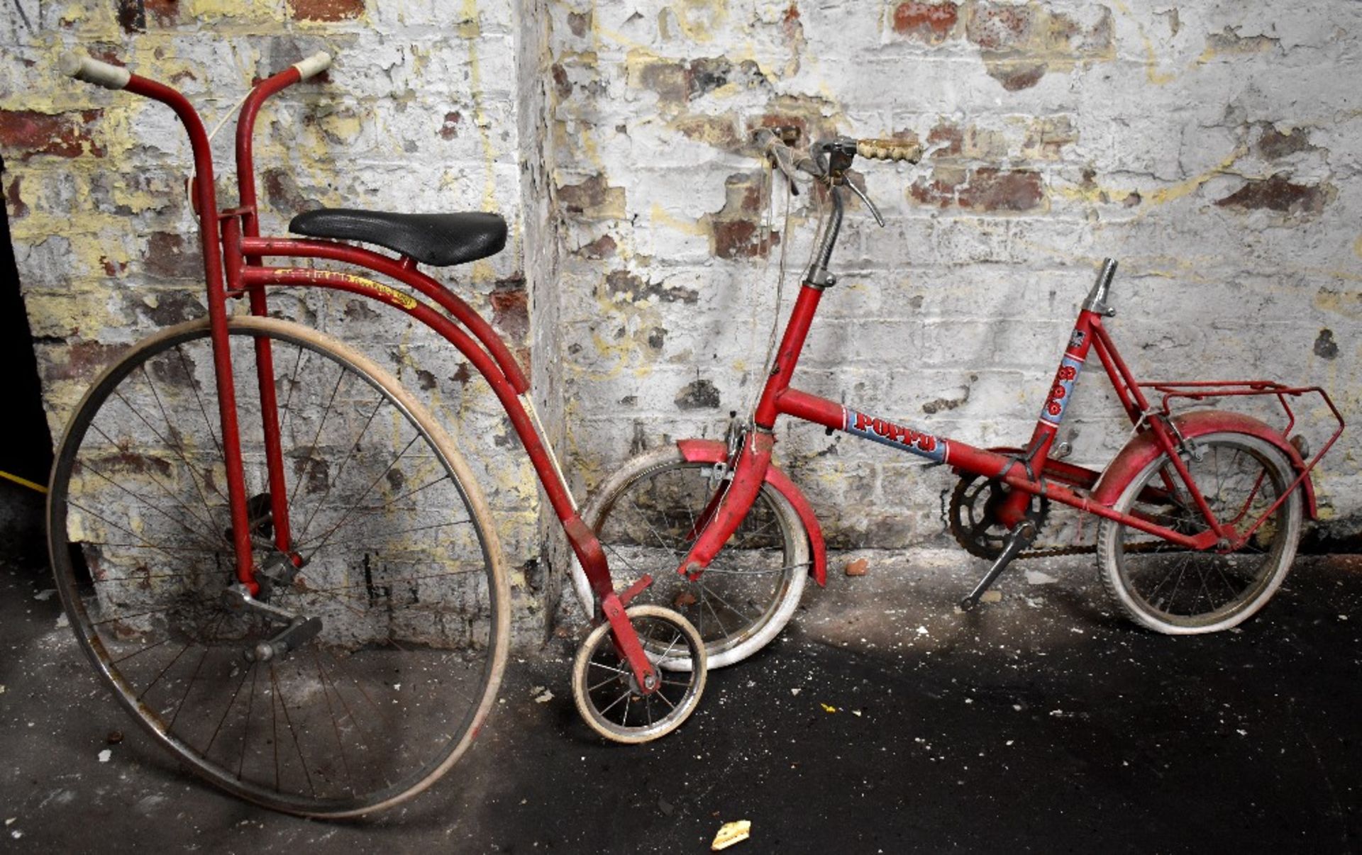 A Raleigh 'Poppy' children's bicycle (lacking pedals and seat),