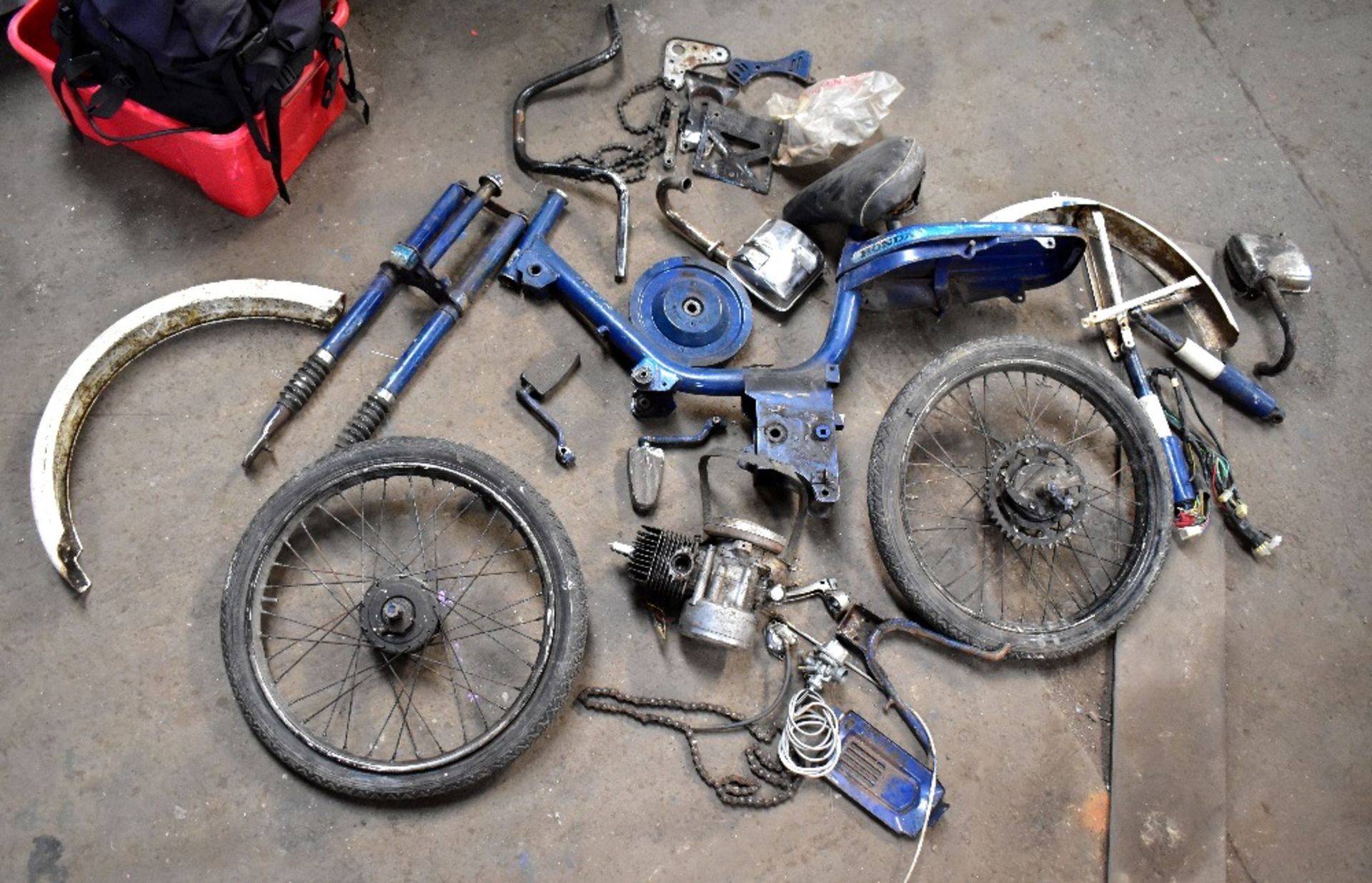 A Honda motorised bicycle in kit form, for restoration (no guarantee to be complete).