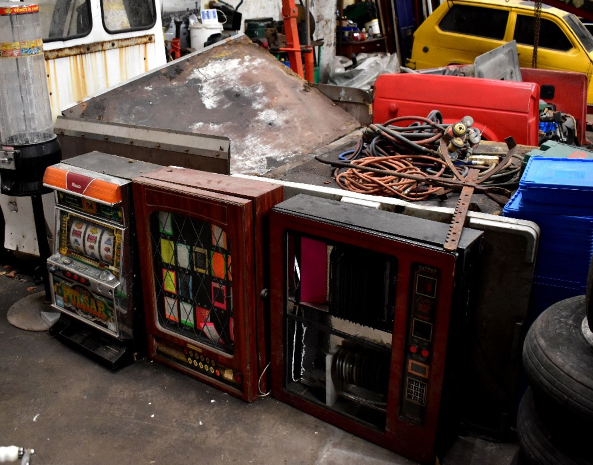 Two wall-mounted jukeboxes for restoration,