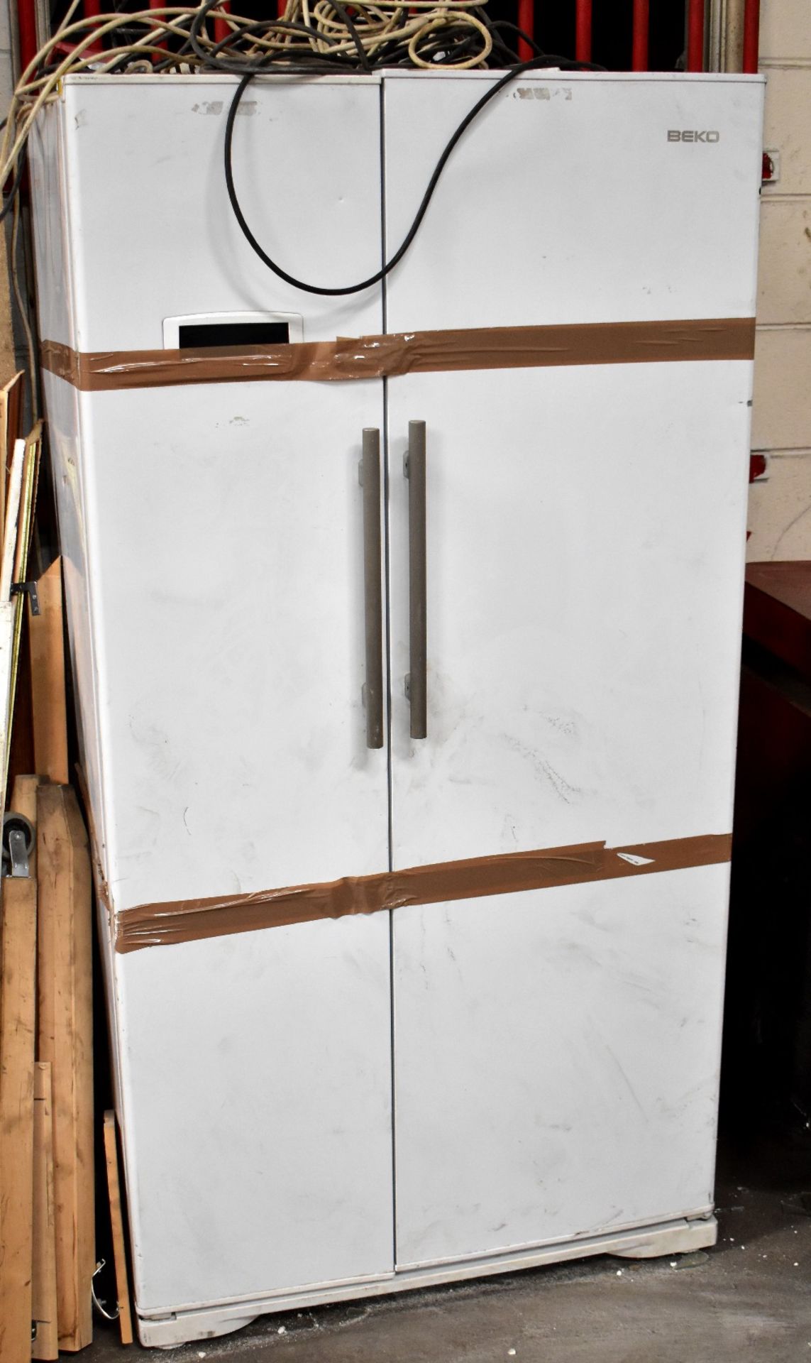 BEKO; an American-style fridge/freezer, height 178cm, width 92cm, depth 67cm (appears complete,