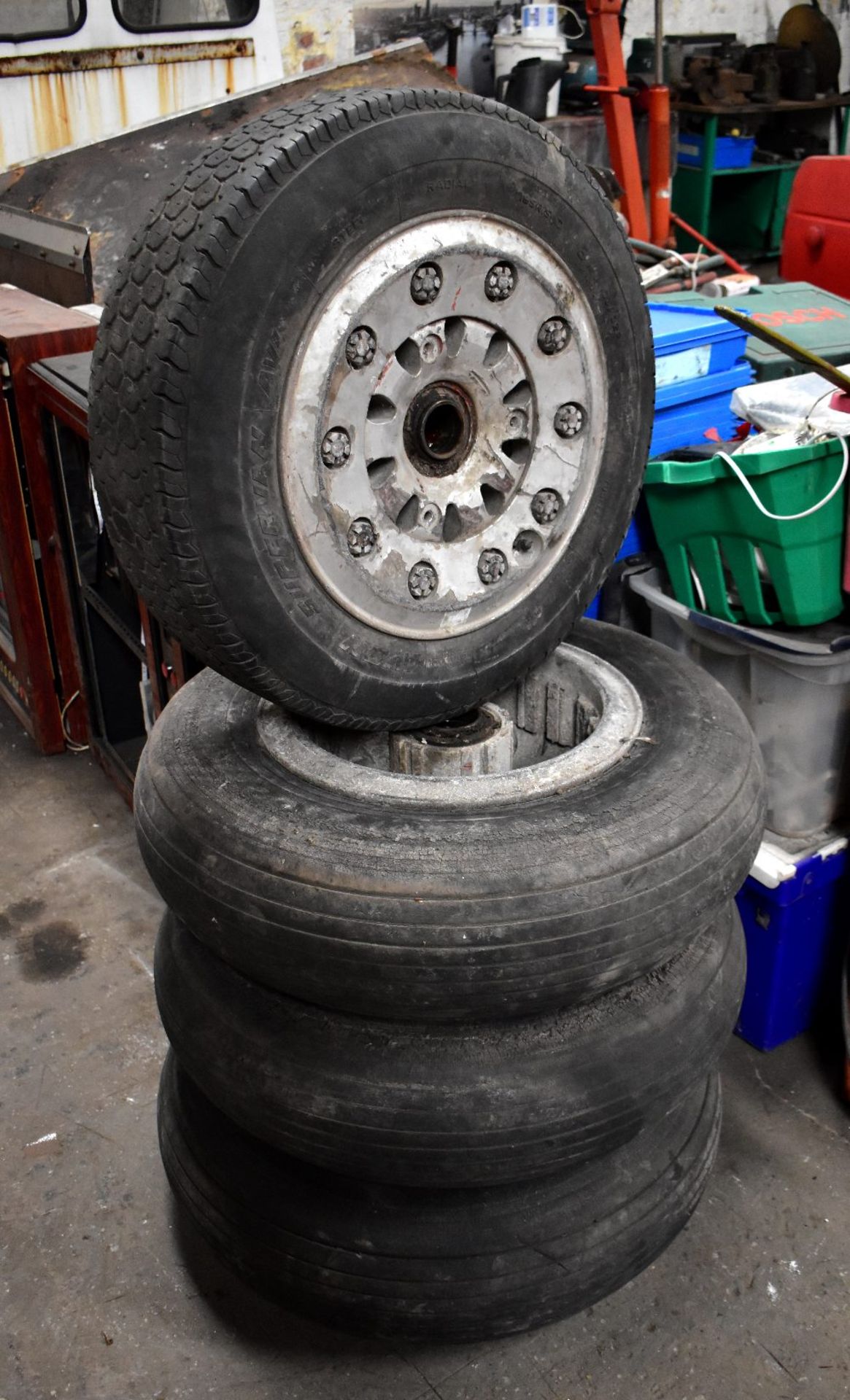 Four aviation wheels, three with original tyres, the last one fitted with a later replacement (4).