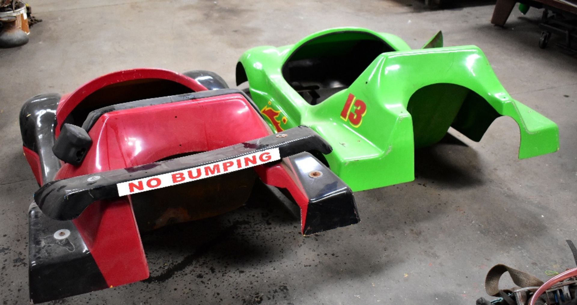 A pair of fibreglass dodgem car shells, one green, with number '13', - Image 2 of 2