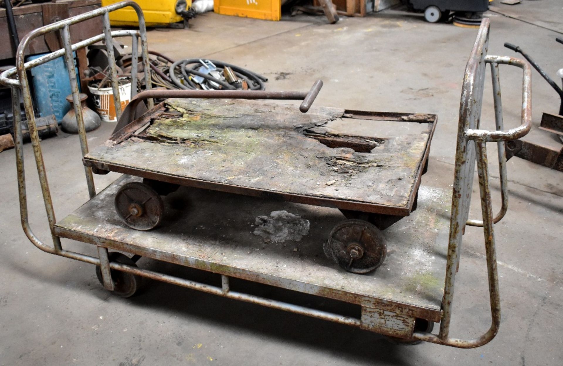 Two vintage trolleys, one with hinged front axle (af) (2).