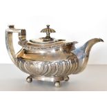 ****WITHDRAWN**** A George III hallmarked silver teapot, with cast floral decoration to the upper