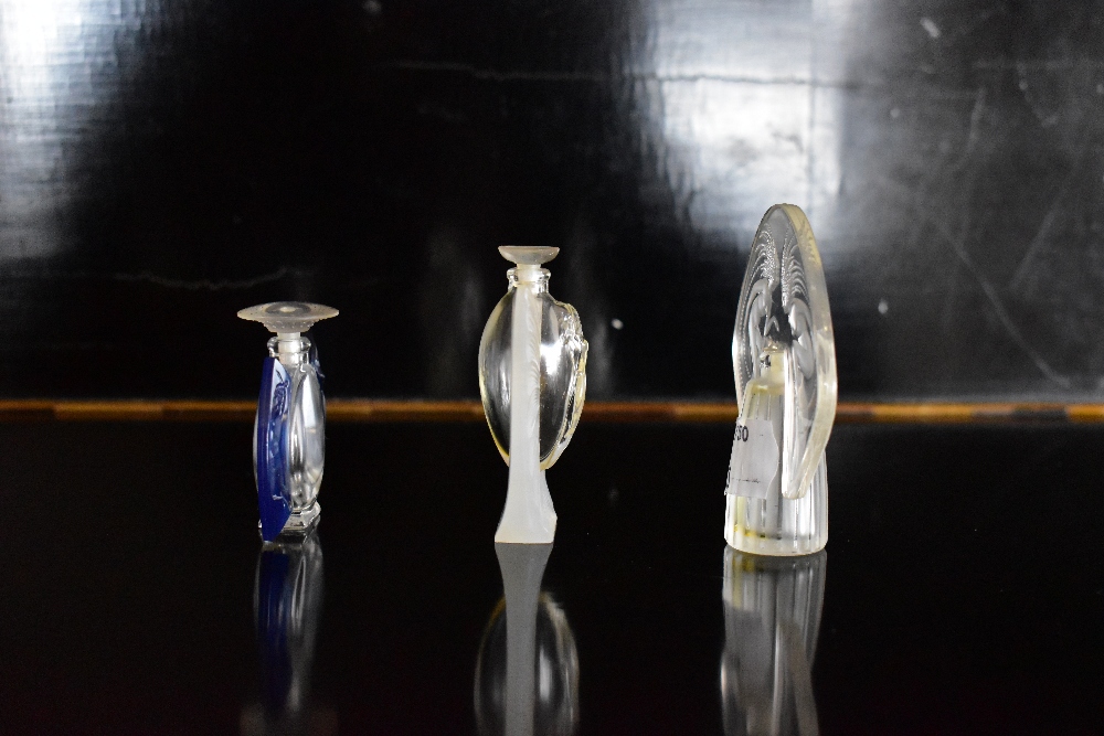 LALIQUE; three contemporary clear glass and plastic perfume bottles (3).Additional - Image 4 of 4