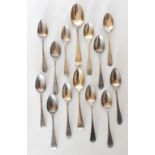 A collection of Georgian and later hallmarked silver teaspoons, including three examples with pin-