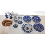 A mixed lot of decorative Oriental items including a Japanese blue and white plate, a pair of modern