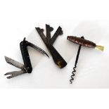 A 19th century horn handled three blade veterinarian fleam, a pocket knife and a corkscrew with