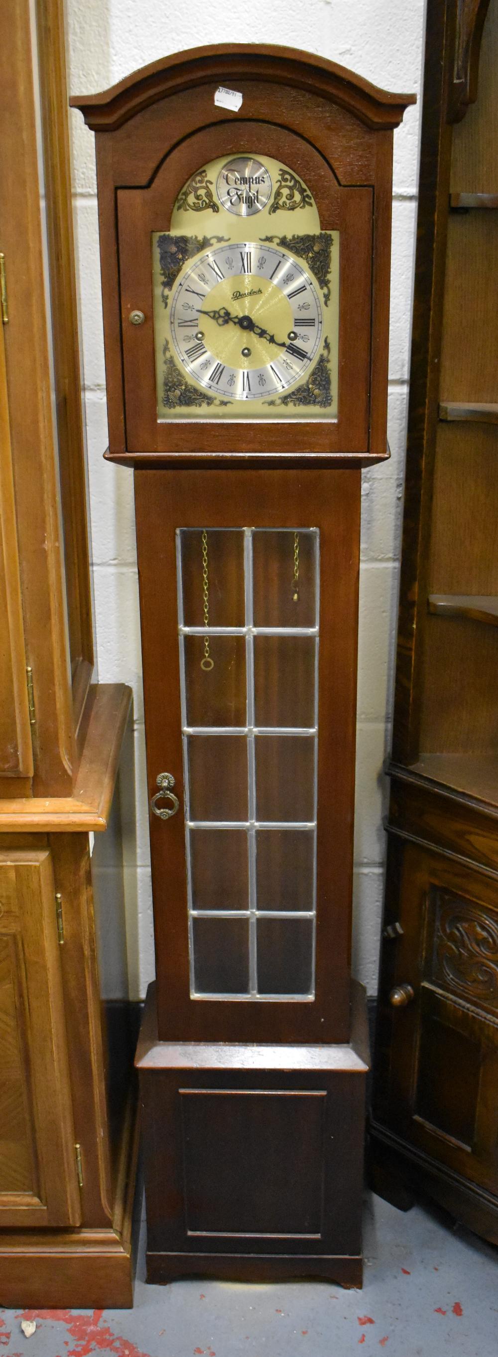 A reproduction mahogany grandmother clock with leaded glazed door,