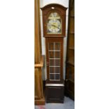 A reproduction mahogany grandmother clock with leaded glazed door,