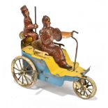 LEHMANN; an early 20th century German tinplate clockwork toy modelled as a driver and rider on a