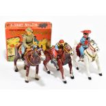 A Japanese tinplate clockwork toy 'Mechanical Western Ranger', in original box, a Japanese jockey on