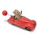 SCHUCO; a Sonny 2005 tinplate clockwork mouse in a car, length 14cm. PROVENANCE: The Collection of