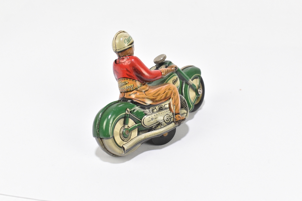 SCHUCO; a German tinplate clockwork Curvo 1000 motorcycle, with rider, length 12cm. PROVENANCE: - Bild 3 aus 4