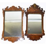 A 19th century George III style walnut fret cut mirror with gilt shell detail, height 65cm, width