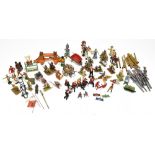 A miscellany of diecast figures and models including various horses and loose riders, a model of a