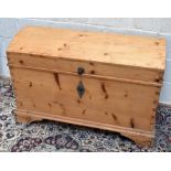 A large old pine dome topped blanket box with twin carrying handles, width 109cm.Additional