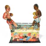 A German tinplate clockwork boxing toy, modelled with two articulated boxing figures supported on